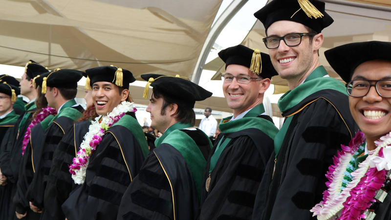 Graduates in cap and gown