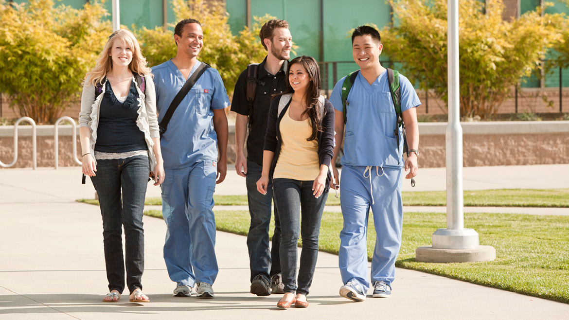 Current students walking down path