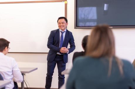 Dr De La Pena teaching in a Pharmacy classroom