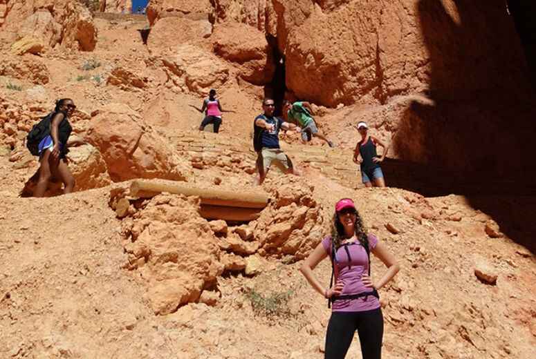 students on field trip climbing mountain